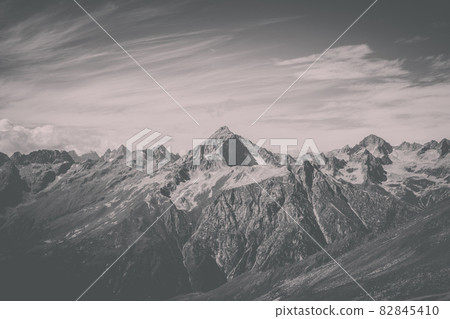 Panorama view of dramatic sky and mountains scene in national park Dombay Panorama view of dramatic sky and mountains scene in national park Dombay 82845410