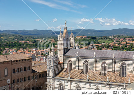 Panoramic view of exterior of Siena Cathedral (Duomo di Siena) Panoramic view of exterior of Siena Cathedral (Duomo di Siena) 82845954