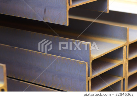 Metal profile beam in packs at the warehouse of metal products Metal profile beam in packs at the warehouse of metal products 82846362