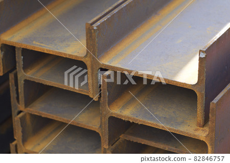 Metal profile beam in packs at the warehouse of metal products Metal profile beam in packs at the warehouse of metal products 82846757