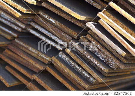 Metal profile strip in packs at the warehouse of metal products 82847861