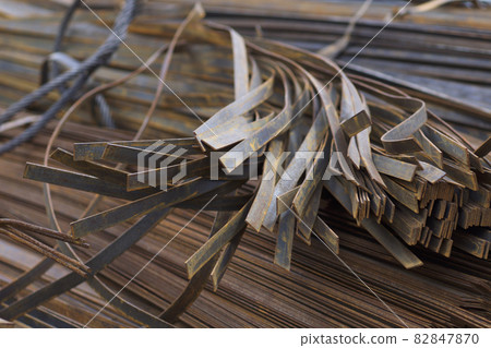 Metal profile strip in packs at the warehouse of metal products 82847870