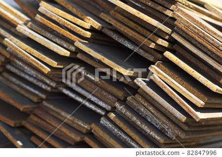 Metal profile strip in packs at the warehouse of metal products 82847996
