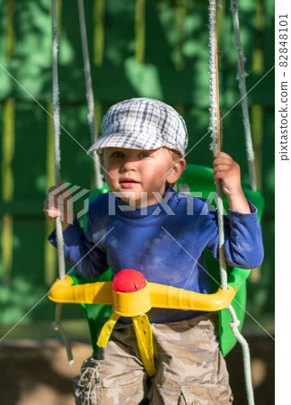 Beautiful baby boy with child face posing photographer Beautiful baby boy with child face posing photographer 82848101