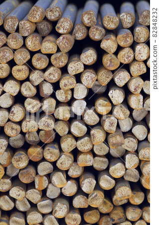 Metal profile of round section in packs at the warehouse of metal products Metal profile of round section in packs at the warehouse of metal products 82848232