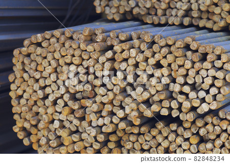 Metal profile of round section in packs at the warehouse of metal products Metal profile of round section in packs at the warehouse of metal products 82848234