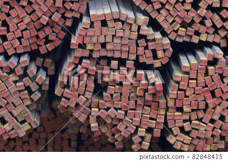 Metal profile square in packs at the warehouse of metal products Metal profile square in packs at the warehouse of metal products 82848415