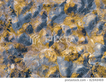 Colorful texture of mining spoil heaps at abandoned pyrite mine, view directly above Colorful texture of mining spoil heaps at abandoned pyrite mine, view directly above 82848469