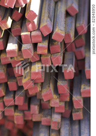 Metal profile square in packs at the warehouse of metal products Metal profile square in packs at the warehouse of metal products 82848950