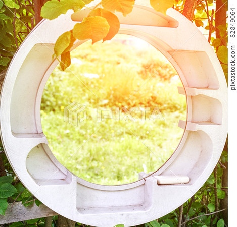 Round mirror in forest. Local travel concept. Sustainable lifestyle. Summer Round mirror in forest. Local travel concept. Sustainable lifestyle. Summer 82849064