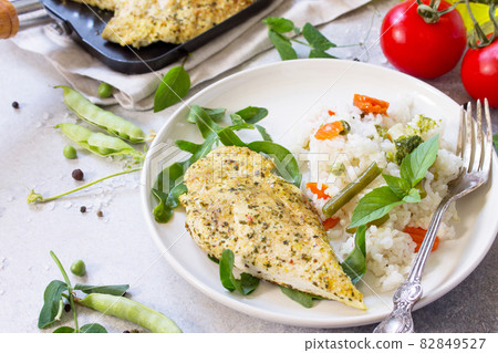 Traditional cooking - wok Fried rice with roasted chicken with spices. Traditional cooking - wok Fried rice with roasted chicken with spices. 82849527