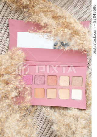 Trend eyeshows flatlay. Powder texture. Make up product. Monochromatic design 82849696