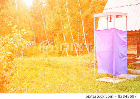 Tent camp shower in forest. Local travel concept. Sustainable lifestyle Tent camp shower in forest. Local travel concept. Sustainable lifestyle 82849697