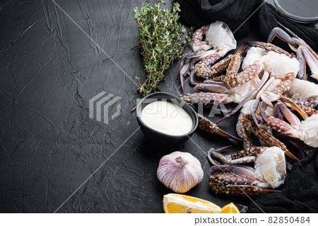Fresh blue swimming crab Horse crab, Blue crab, Flower crab claws, on black background , with copyspace and space for text Fresh blue swimming crab Horse crab, Blue crab, Flower crab claws, on black background , with copyspace and space for text 82850484