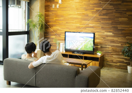 A couple in the living room 82852440