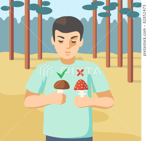 A young man in the forest holds a poisonous mushroom in one hand, an edible mushroom in the other.  82852473