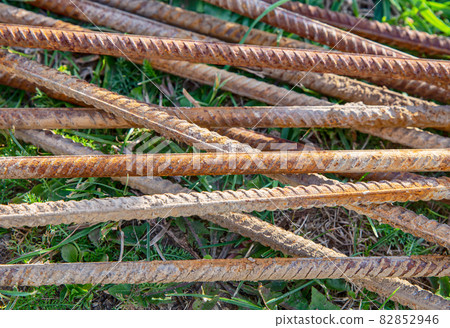 iron reinforcement rod rusty lies in a heap on the ground base for the foundation iron reinforcement rod rusty lies in a heap on the ground base for the foundation 82852946