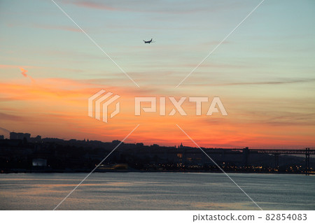 Lisbon harbor scenery at sunrise 82854083