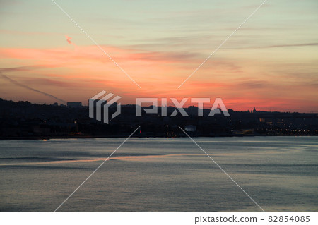 Lisbon harbor scenery at sunrise 82854085