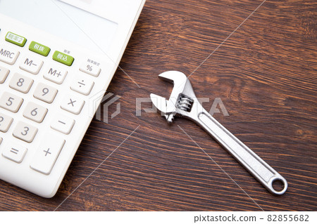 Wrench and calculator cost image Wrench and calculator cost image 82855682
