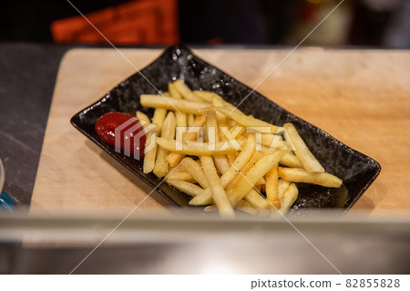 Izakaya french fries freshly fried potatoes 82855828