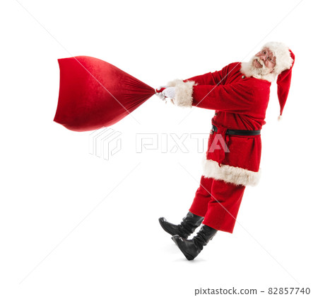 Santa Claus with bag with gifts 82857740