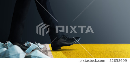Start Concept. Business Strategy to Pass Through Coronavirus Situation. Businessman Steps and Moving Forward to New Challenge. Start Line with Used Medical Mask 82858699