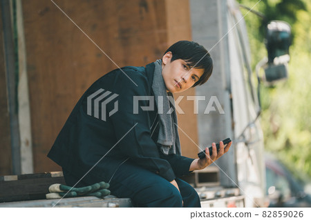 Smartphone and truck driver 82859026