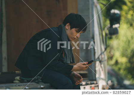 Smartphone and truck driver 82859027