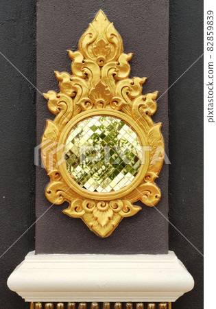 flower statue with mettalic reflecting mirror thai style art crafting painted with gold color, gold painting carving sculpture of flower,home decoration poster wallpaper backgrounds flower statue with mettalic reflecting mirror thai style art crafting painted with gold color, gold painting carving sculpture of flower,home decoration poster wallpaper backgrounds 82859839