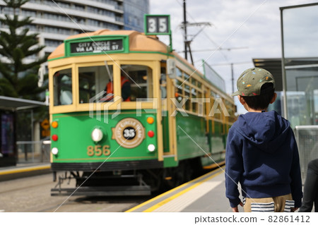 Waiting for the famous retro tram in Melbourne, Australia Waiting for the famous retro tram in Melbourne, Australia 82861412
