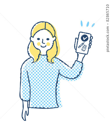 一位女士在智能手機上展示疫苗護照 82865710