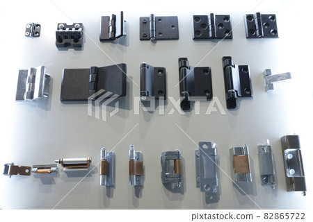 door hinges and other door hardware placed on stand door hinges and other door hardware placed on stand 82865722