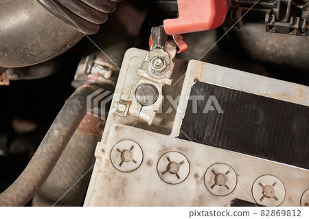 Old starter battery in a car Old starter battery in a car 82869812