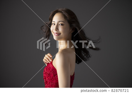 Woman in a red dress 82870721