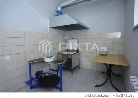 Pottery workhop. Potter wheel, stove, hood and other equipment 82871183