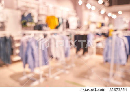 Empty blurry mall background. Defocused wallpaper. Business office interior Empty blurry mall background. Defocused wallpaper. Business office interior 82873254