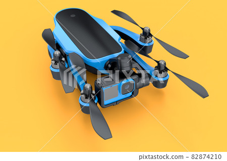 Flying photo and video drone or quad copter with action camera on yellow 82874210