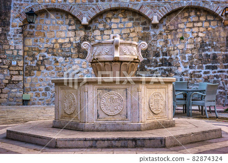 Fountain near church 82874324