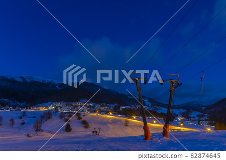 evening skiing in ski center Donovaly, Low Tatras, Slovakia evening skiing in ski center Donovaly, Low Tatras, Slovakia 82874645