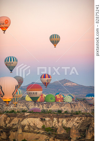 Bright hot air balloons in sky of Cappadocia, Turkey 82875241