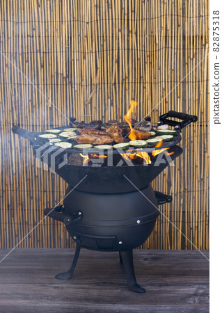 marinated chicken with potatoes on a garden grill marinated chicken with potatoes on a garden grill 82875318
