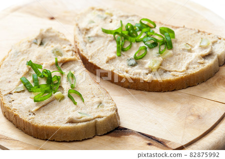 cracklings spread on bread with spring onion cracklings spread on bread with spring onion 82875992