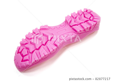 3D printer printed pink shoe soles in natural size isolated on white background 3D printer printed pink shoe soles in natural size isolated on white background 82877217