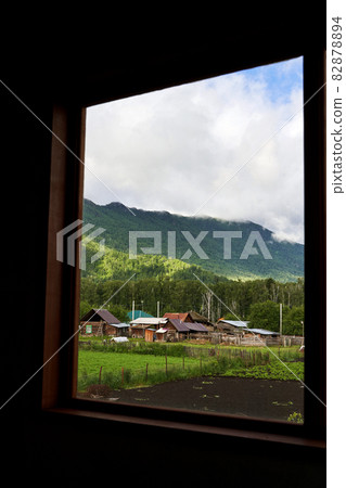 Holistay house. Countryside hiking. Window. Vacation landscape. Russian Altai Holistay house. Countryside hiking. Window. Vacation landscape. Russian Altai 82878894