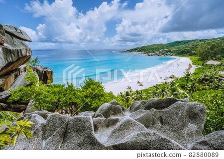 Panorama view of most spectacular tropical beach Grande Anse on La Digue Island, Seychelles. Vacation holidays lifestyle concept Panorama view of most spectacular tropical beach Grande Anse on La Digue Island, Seychelles. Vacation holidays lifestyle concept 82880089