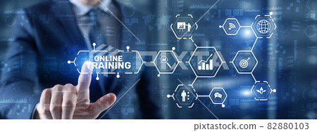 Online Training concept. Business Hand pressing OT inscription Online Training concept. Business Hand pressing OT inscription 82880103
