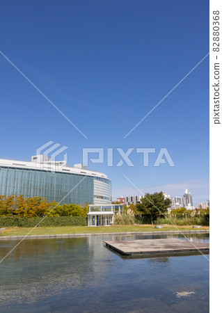 Niigata City Performing Arts Center seen from the aerial garden of Hakusan Park 82880368