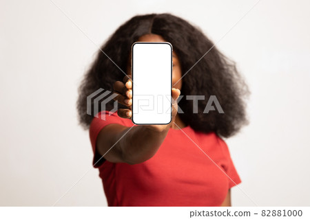 Mobile Advertisement. Unrecognizable African American Woman Covering Face Blank Smartphone 82881000