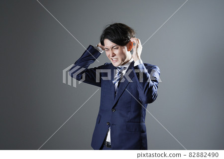 Businessman headache Businessman headache 82882490